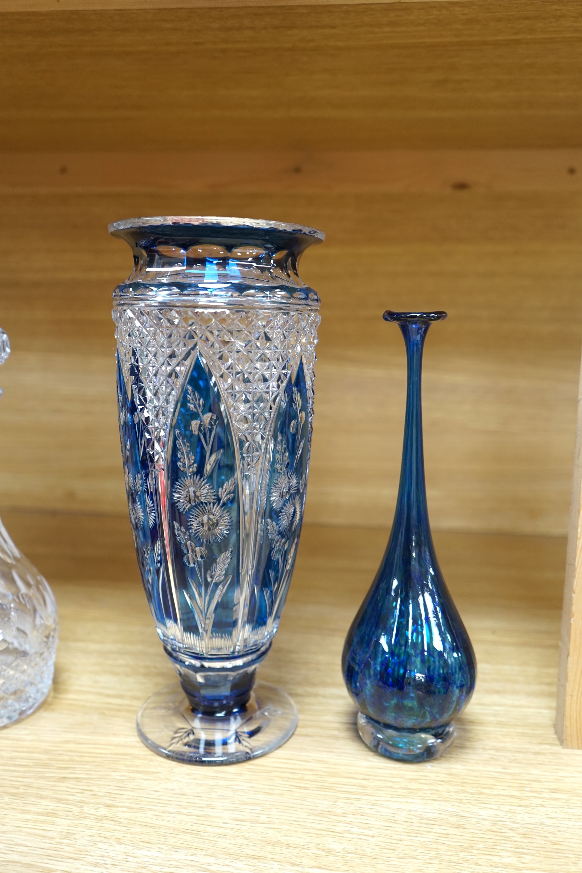 A collection of mixed 19th/20th century coloured glassware, to include a monogrammed cranberry bowl and plate, a flashed glass vase and a small opaque floral vase, largest 34cm high. Condition - fair to good